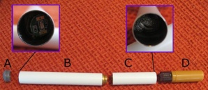 A: indicateur lumineux de fonctionnement; B: batterie et circuits intégrés; C: atomiseur et élément de chauffe; D: cartouche et embout. Photo (c) Horsten
