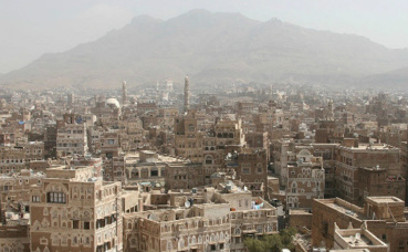 Sanaa, capitale du Yémen, entourée de montages. Photo (c) Ferdinand Reus. Sanaa, capitale du Yémen, entourée de montages. Photo (c) Ferdinand Reus.