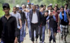 Balkans: Des réfugiés et des migrants frappés par la police